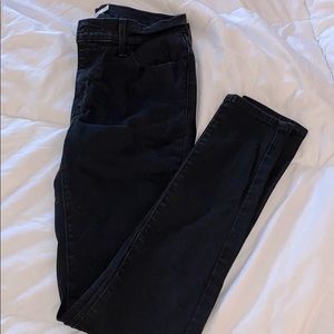 Black Levi skinny jeans.
